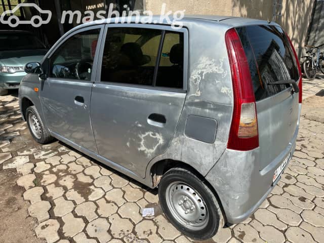 Daihatsu Cuore VI (L251) 1.0 MT