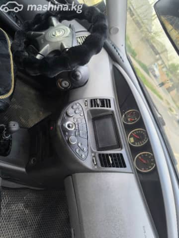 Nissan Primera III (P12) 1.8 MT