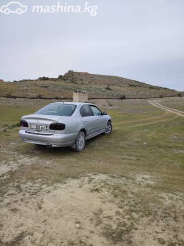 Nissan Primera II (P11) Рестайлинг 1.8 MT