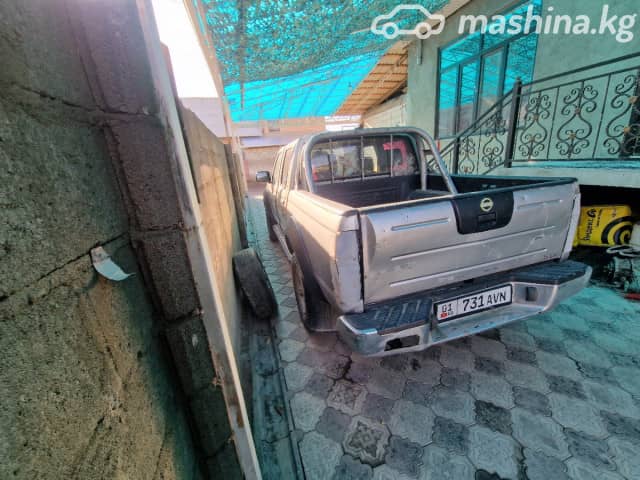 Nissan Navara (Frontier) II (D22) 2.5d MT 4WD