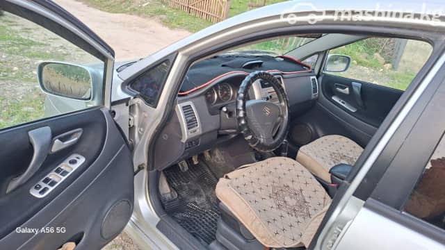 Suzuki Liana I Рестайлинг 1.6 MT 4WD