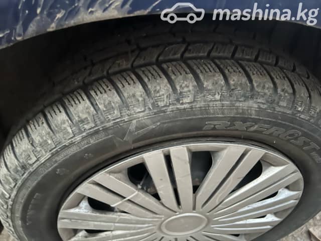 Nissan March III (K12) 1.4 AT 4WD