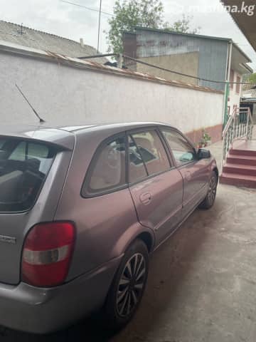Mazda 323 VI (BJ) Рестайлинг 1.6 MT