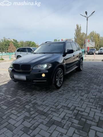 BMW X5 II (E70) 48i 4.8 AT 4WD