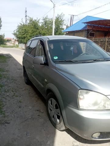 Kia Carens I (RS) Рестайлинг 1.8 MT
