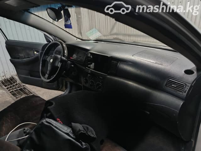 Toyota Corolla IX (E120, E130) 1.8 AT