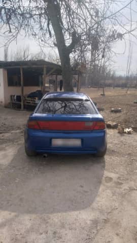 Mazda 323 V (BA) 1.5 MT