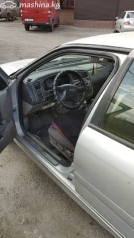 Nissan Primera II (P11) Рестайлинг 1.8 MT