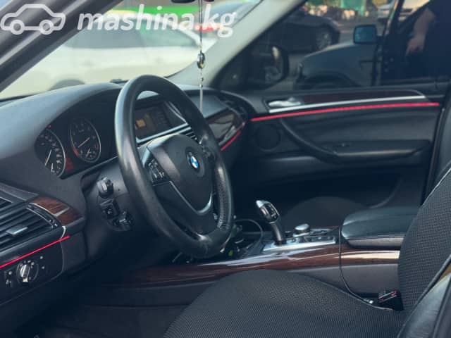 BMW X5 II (E70) 48i 4.8 AT 4WD