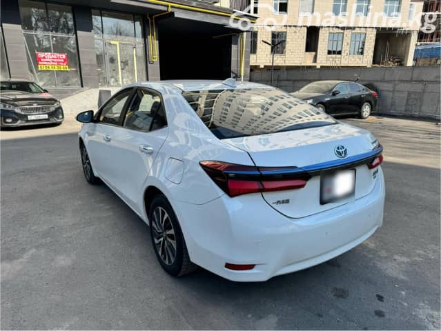 Toyota Corolla XI (E160, E170, E180) Рестайлинг 1 1.8hyb CVT