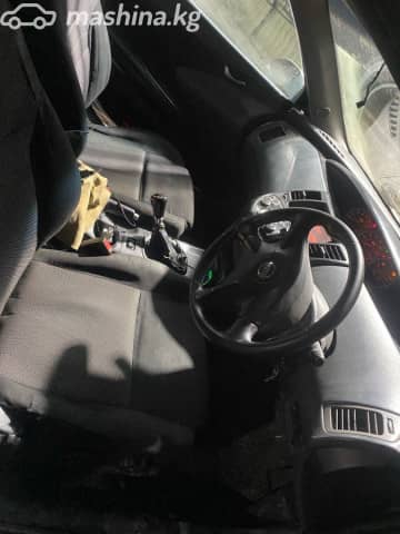 Nissan Primera III (P12) 1.8 MT