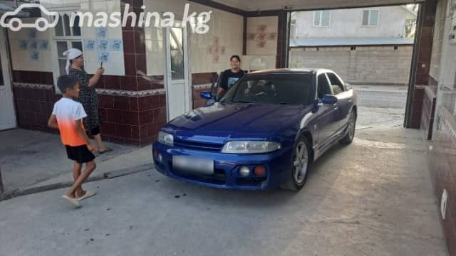 Nissan Skyline IX (R33) 2.5 AT