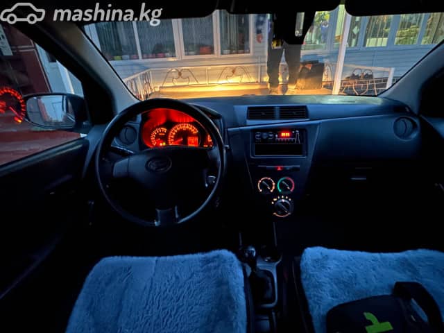 Daihatsu Cuore VII (L276) 1.0 MT
