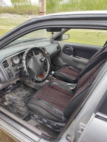 Nissan Primera II (P11) Рестайлинг 1.8 MT