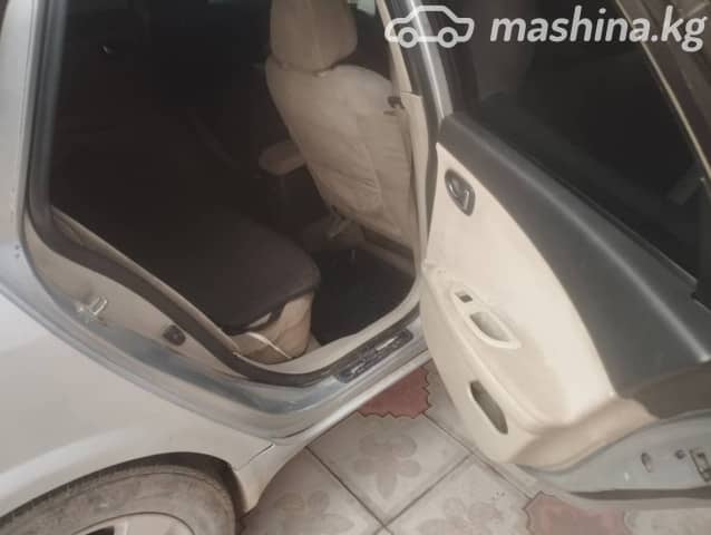 Nissan Primera III (P12) 1.8 MT