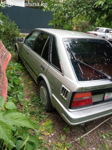 Nissan Bluebird VIII (T12, T72) 2.0 MT