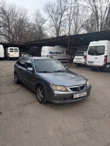 Mazda 323 VI (BJ) Рестайлинг 1.6 MT