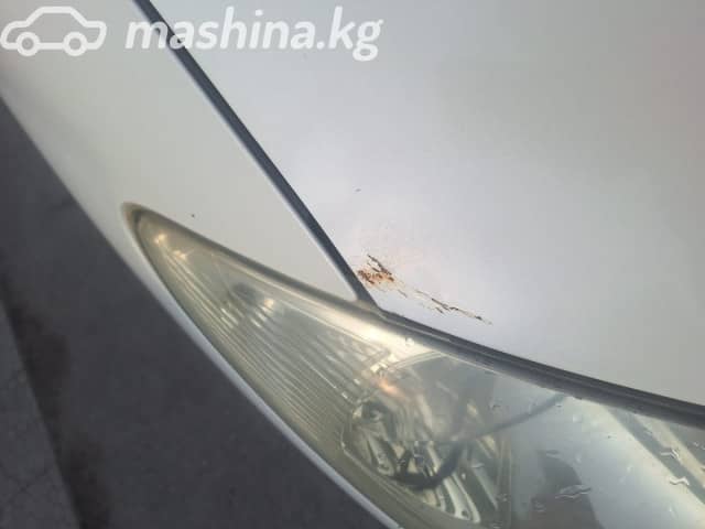 Toyota Estima II Рестайлинг 2.4 AT 4WD