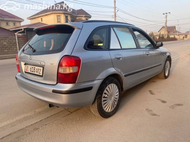 Mazda 323 VI (BJ) Рестайлинг 1.6 MT