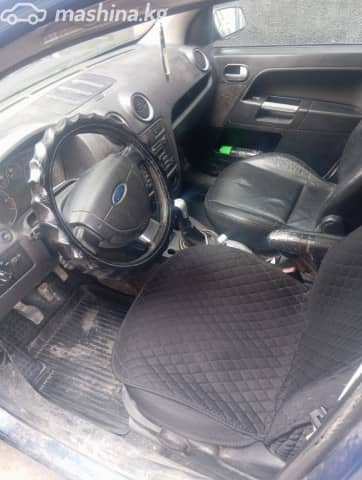 Ford Fusion I Рестайлинг 1.6 MT