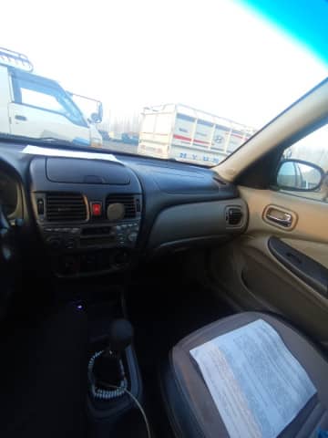 Nissan Almera II (N16) 1.5 MT