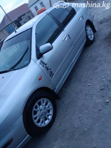 Nissan Primera II (P11) Рестайлинг 1.8 MT