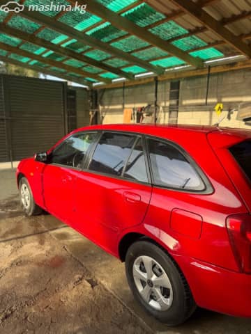 Mazda 323 VI (BJ) Рестайлинг 1.6 MT
