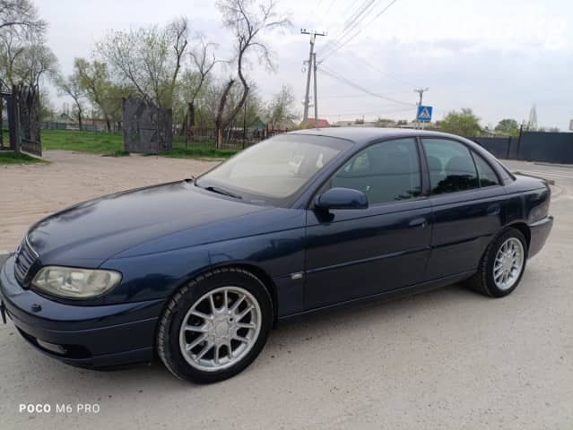 Opel Omega B Рестайлинг 2.2 MT