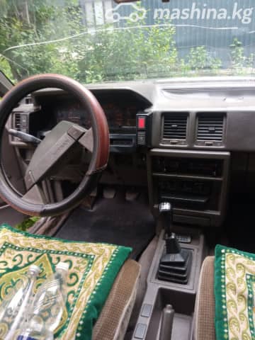 Nissan Bluebird VIII (T12, T72) 2.0 MT