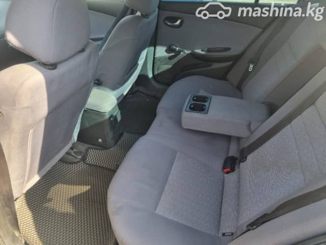 Nissan Primera III (P12) 1.6 MT