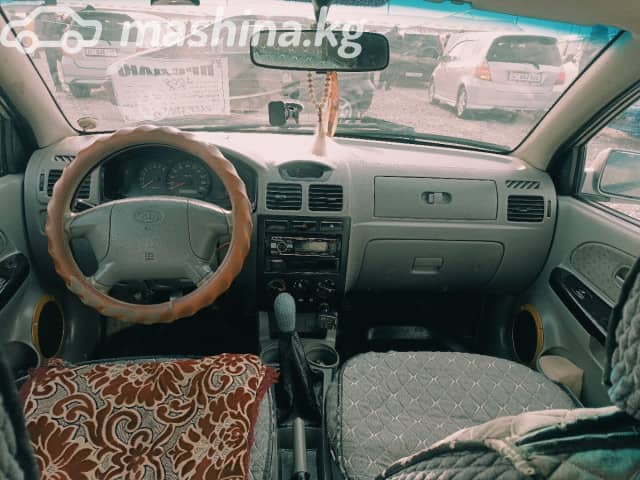 Kia Rio I 1.6 MT