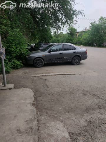 Nissan Almera II (N16) Рестайлинг 1.5 MT