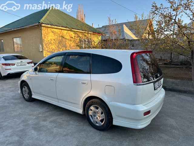 Honda Stream I Рестайлинг 1.7 AT 4WD
