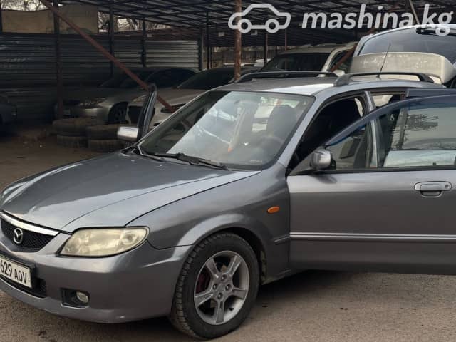 Mazda 323 VI (BJ) Рестайлинг 1.6 MT
