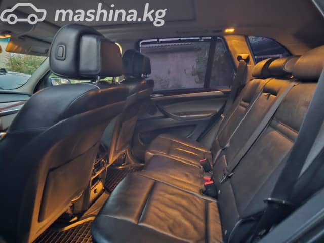 BMW X5 II (E70) 48i 4.8 AT 4WD