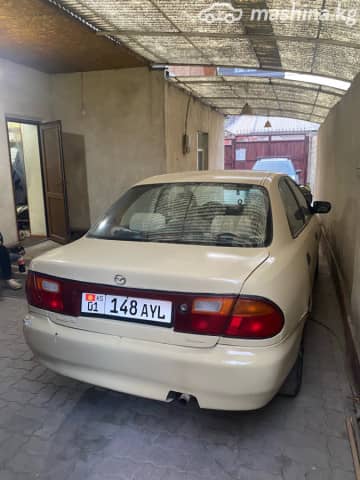 Mazda 323 V (BA) 1.5 AT