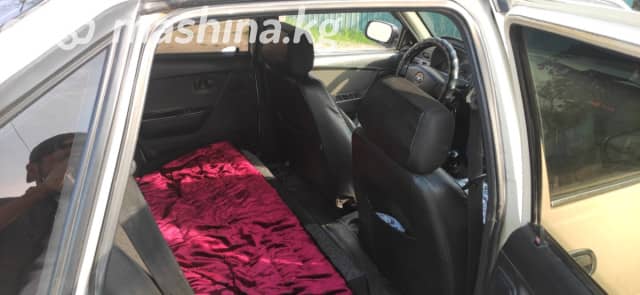 Daewoo Nexia I Рестайлинг 1.5 MT