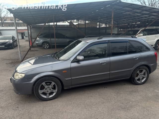 Mazda 323 VI (BJ) Рестайлинг 1.6 MT