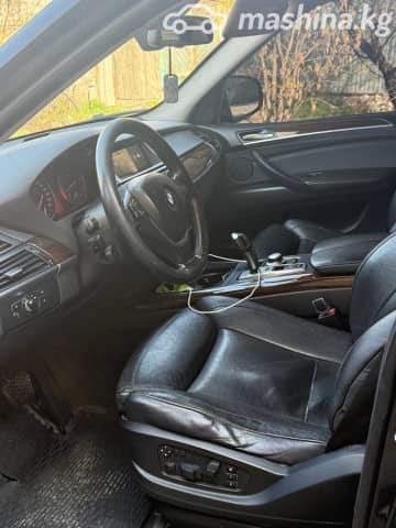 BMW X5 II (E70) 48i 4.8 AT 4WD
