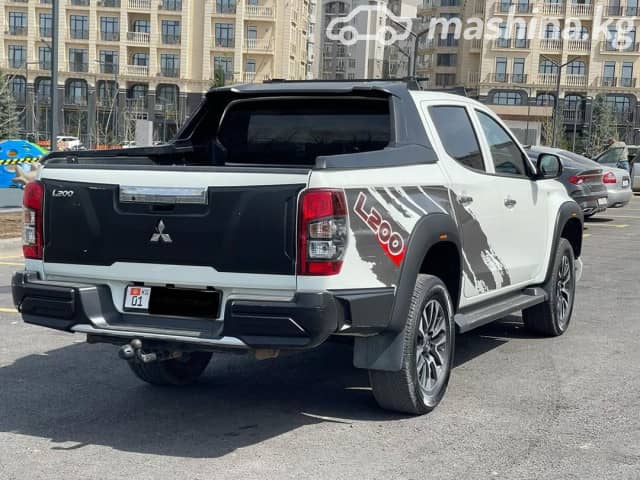 Mitsubishi L200 V Рестайлинг 2.4 MT 4WD