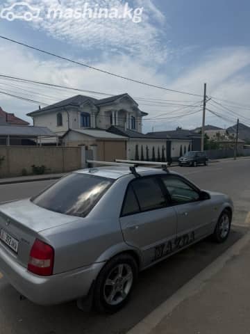 Mazda 323 VI (BJ) Рестайлинг 1.6 MT