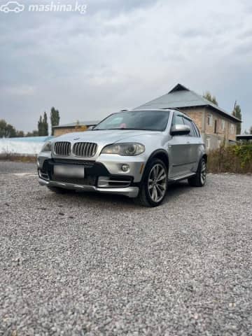 BMW X5 II (E70) 48i 4.8 AT 4WD