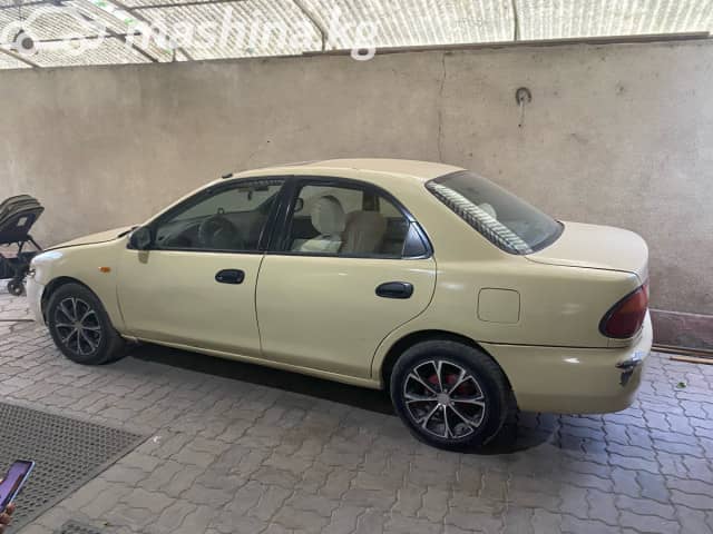 Mazda 323 V (BA) 1.5 AT
