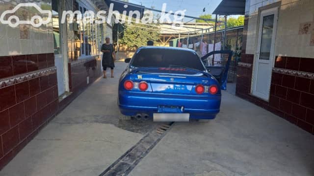 Nissan Skyline IX (R33) 2.5 AT