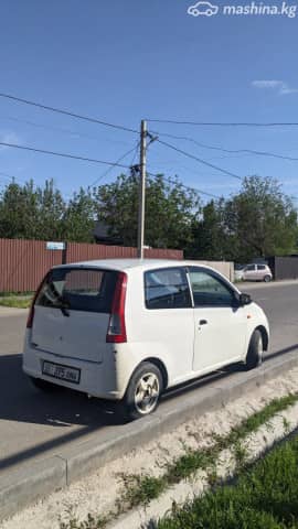 Daihatsu Cuore VI (L251) 1.0 MT