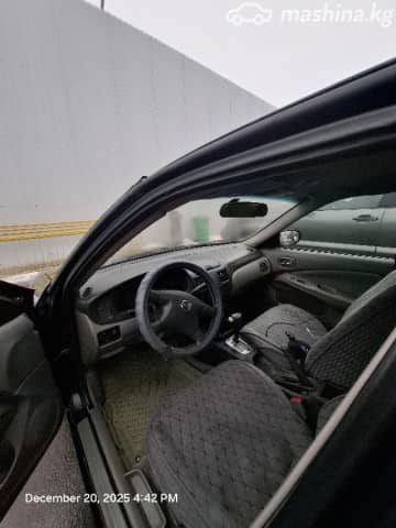 Nissan Sentra V (B15) 1.8 AT