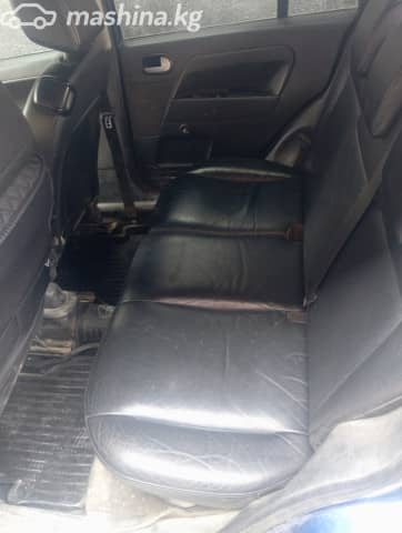 Ford Fusion I Рестайлинг 1.6 MT