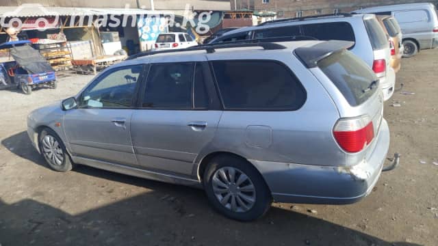 Nissan Primera II (P11) Рестайлинг 2.0 MT