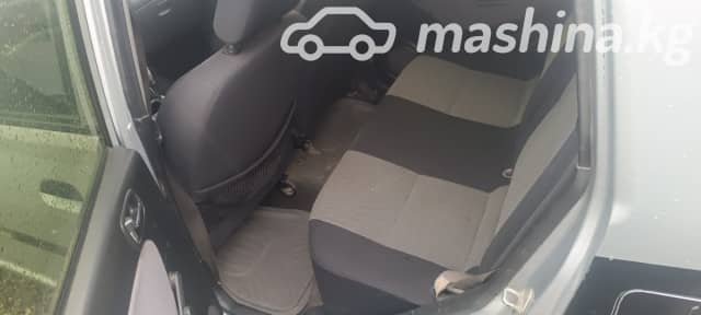 Daihatsu Cuore VI (L251) 1.0 MT