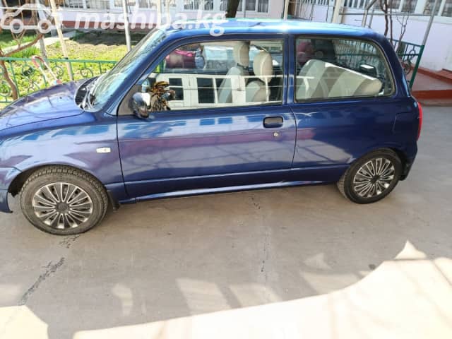 Daihatsu Cuore V (L700) 1.0 MT